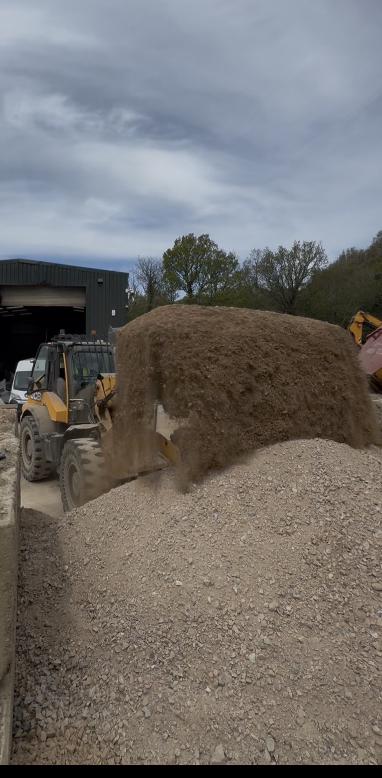 JCB handling aggregate material